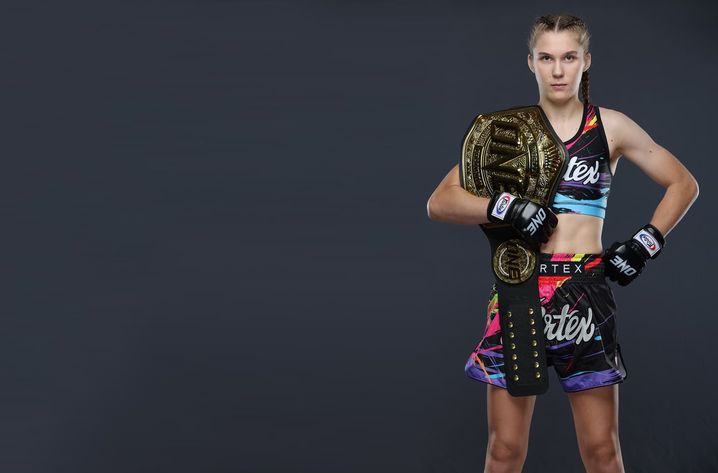 Smilla Sundell with the ONE Championship world title belt